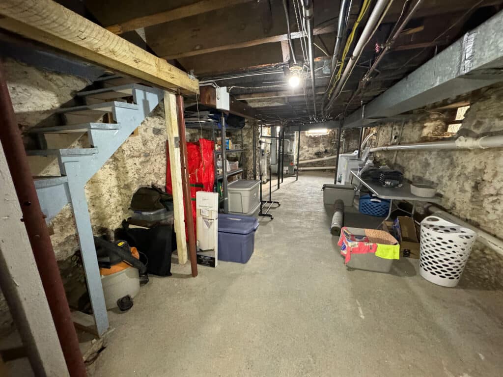 Temporary support beams were used in this basement after damage occured.