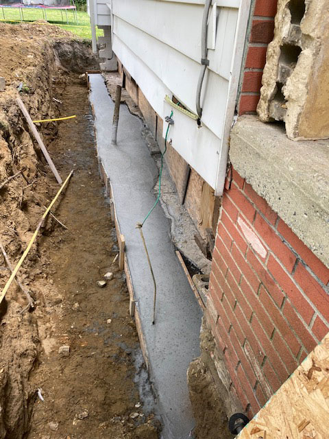 Poured foundation for repair