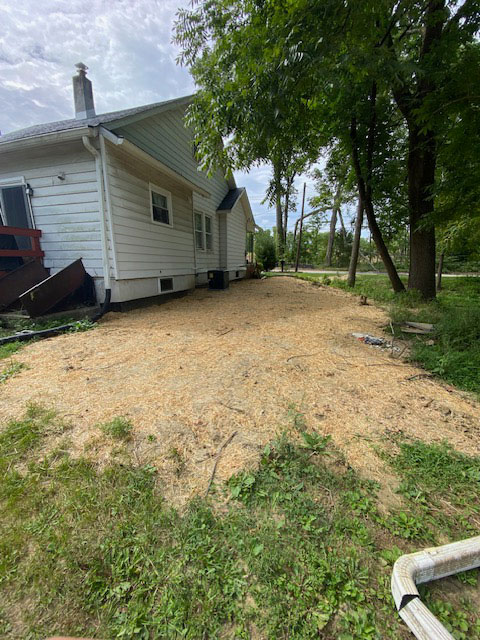 After the foundation repair, yard and home look safe.